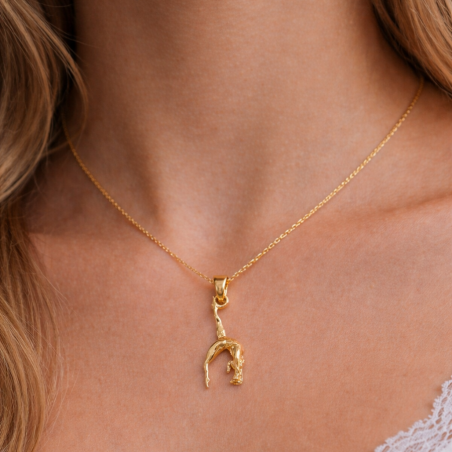 Pendentif figure gymnaste or